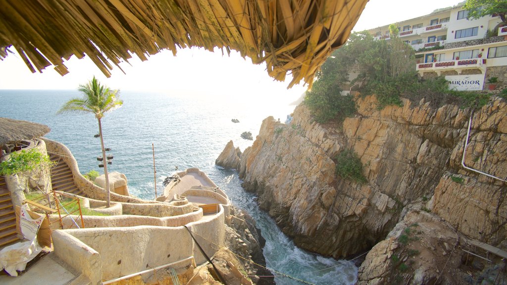 La Quebrada Cliffs which includes a gorge or canyon, a luxury hotel or resort and rocky coastline