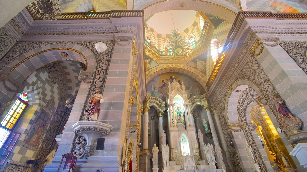 Immaculate Conception Cathedral showing religious elements, heritage architecture and interior views