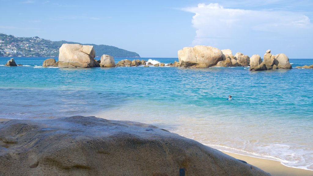 Plage de Condesa montrant une plage de sable