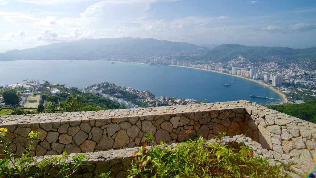 Capilla de la Paz featuring views, a coastal town and a church or cathedral