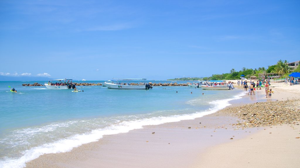 Costa Sur de Nayarit que incluye botes y una playa