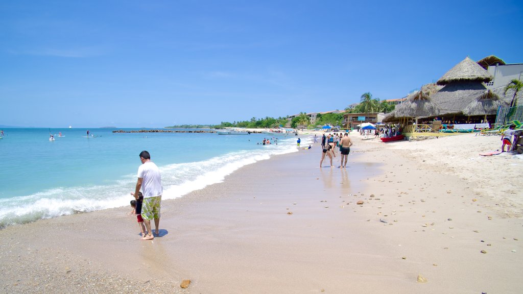 South Coast Nayarit which includes tropical scenes, a sandy beach and a beach bar