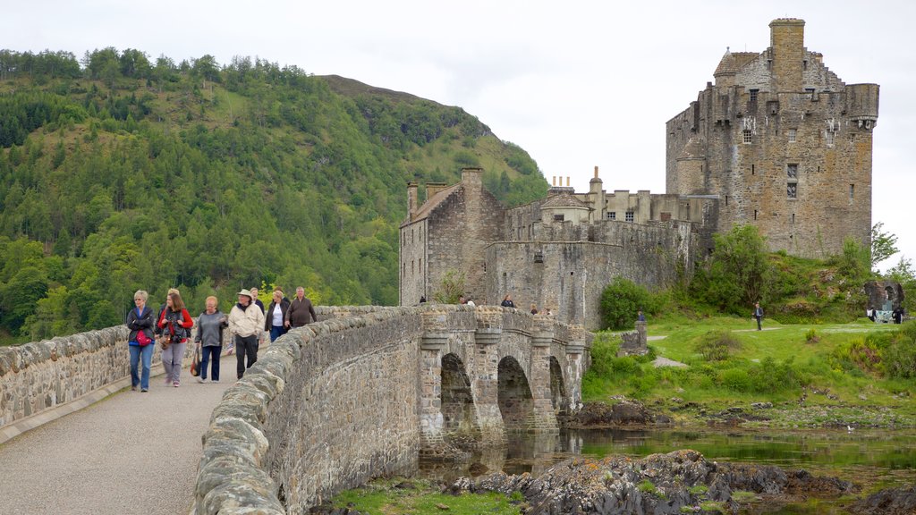 Eilean Donan Castle featuring heritage elements, a river or creek and château or palace