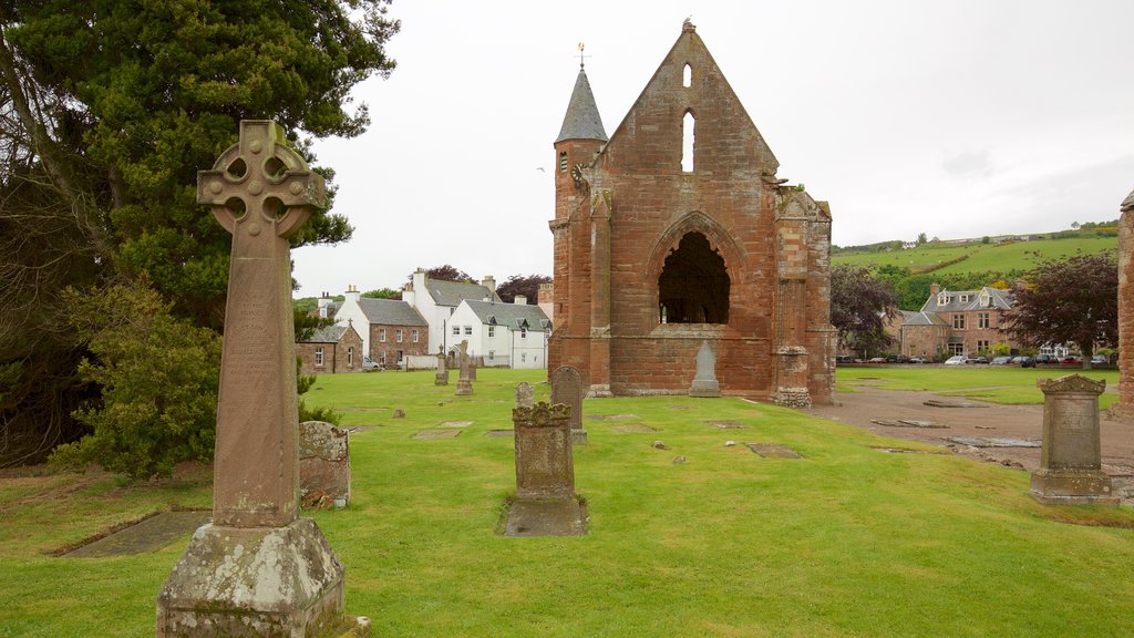 Fortrose Cathedral showing a ruin, a church or cathedral and a cemetery