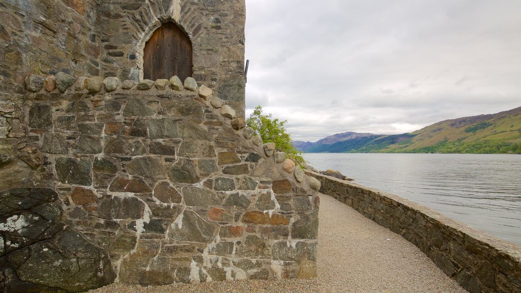 Eilean Donan Castle which includes a lake or waterhole, chateau or palace and heritage architecture