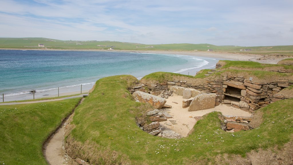 Skara Brae which includes a beach, heritage architecture and heritage elements