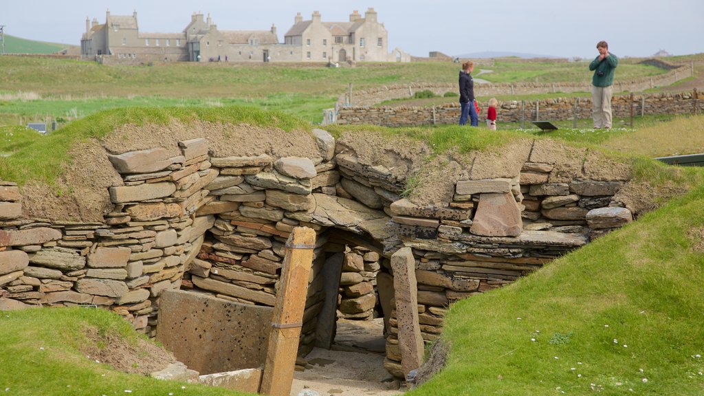 Skara Brae featuring heritage architecture, heritage elements and tranquil scenes