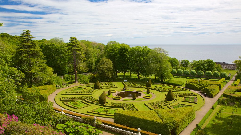 Dunrobin Castle featuring a garden, heritage elements and chateau or palace