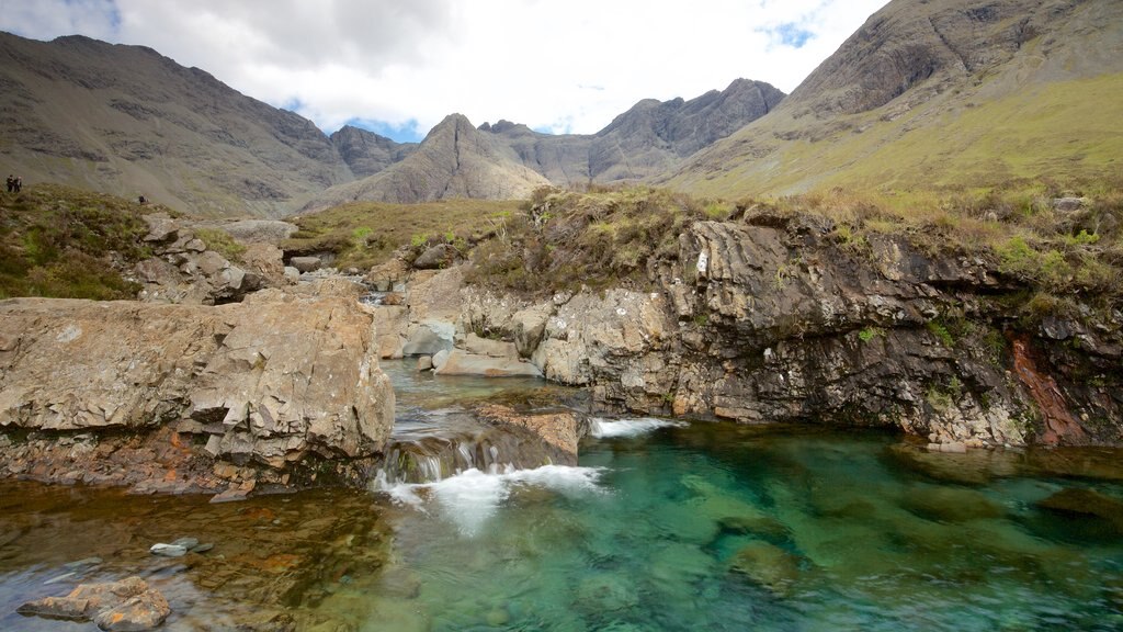 Isle of Skye featuring a pond, mountains and tranquil scenes