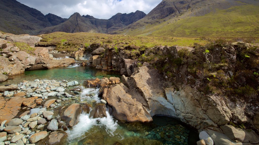 Isle of Skye which includes tranquil scenes, a river or creek and mountains