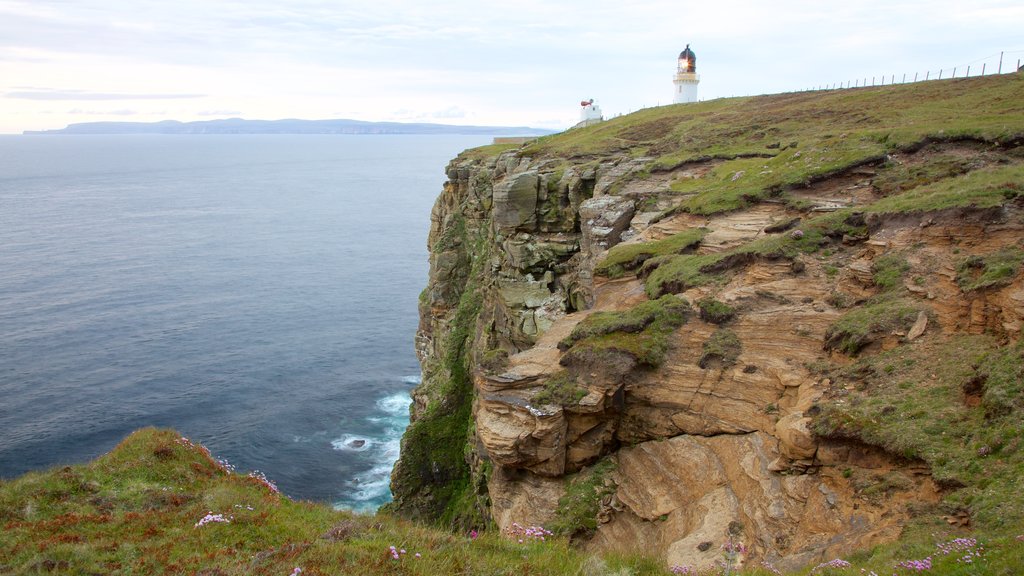 Dunnet Head Lighthouse showing a lighthouse and rugged coastline