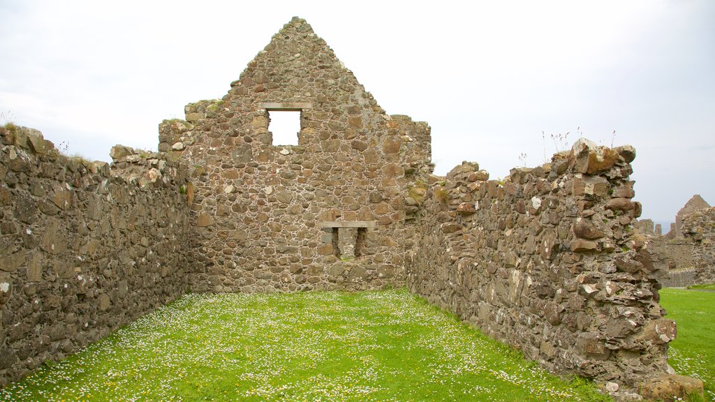 Dunluce Castle featuring heritage architecture, a ruin and chateau or palace