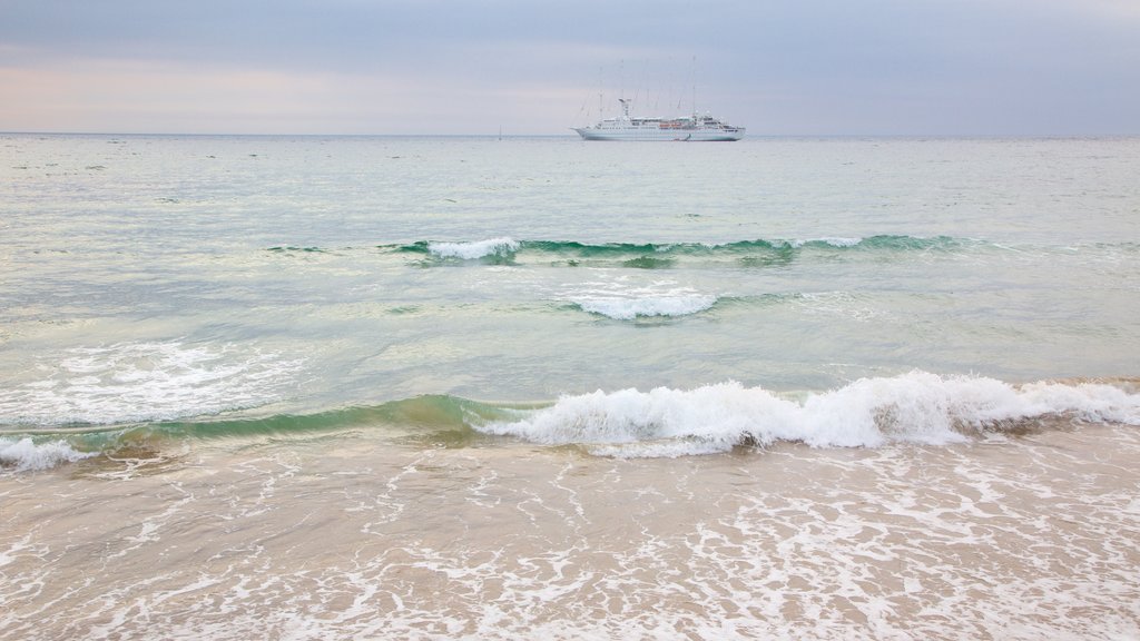 Portrush Beach showing a beach, general coastal views and cruising