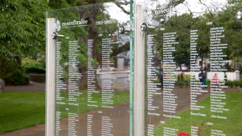 Tralee Town Park showing signage and a garden