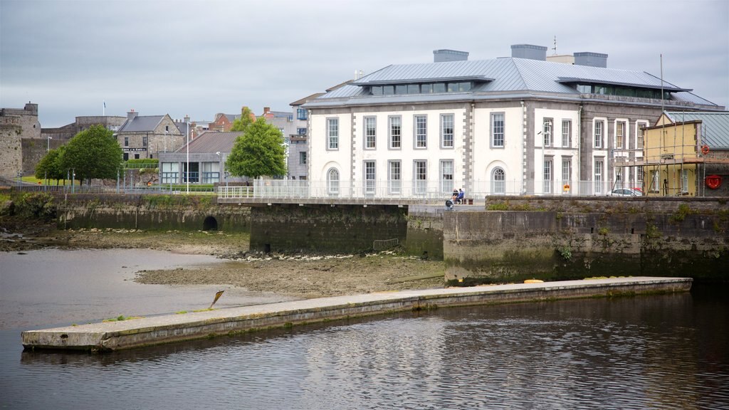 Limerick showing a marina and a river or creek