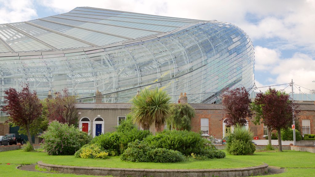 Aviva Stadium showing a park, heritage architecture and modern architecture