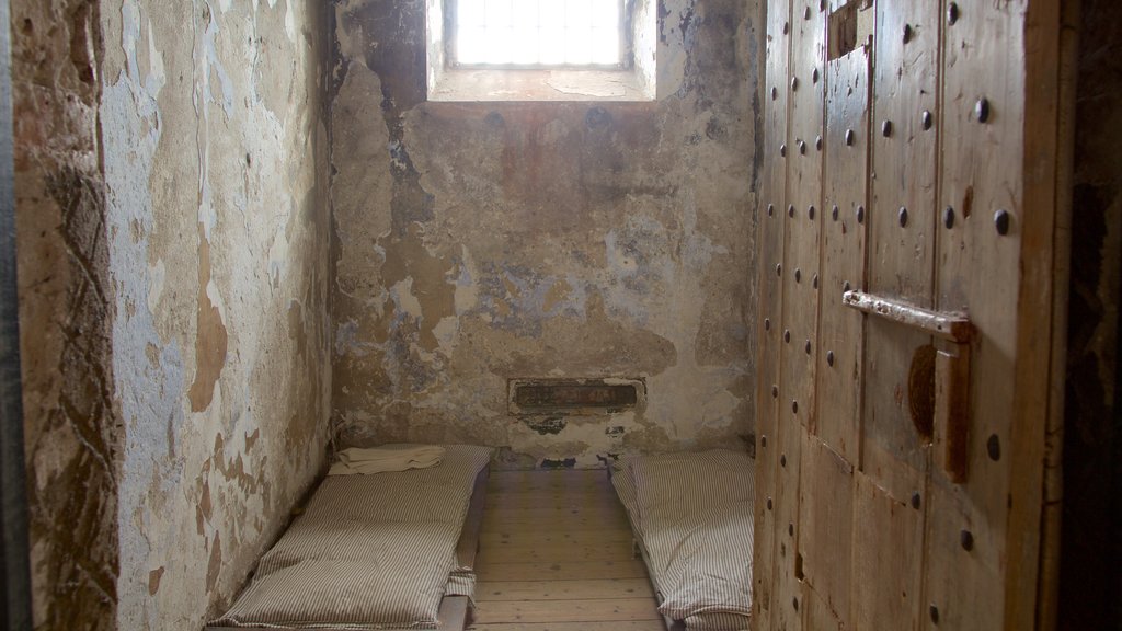 Cork City Gaol showing an administrative building, heritage elements and interior views