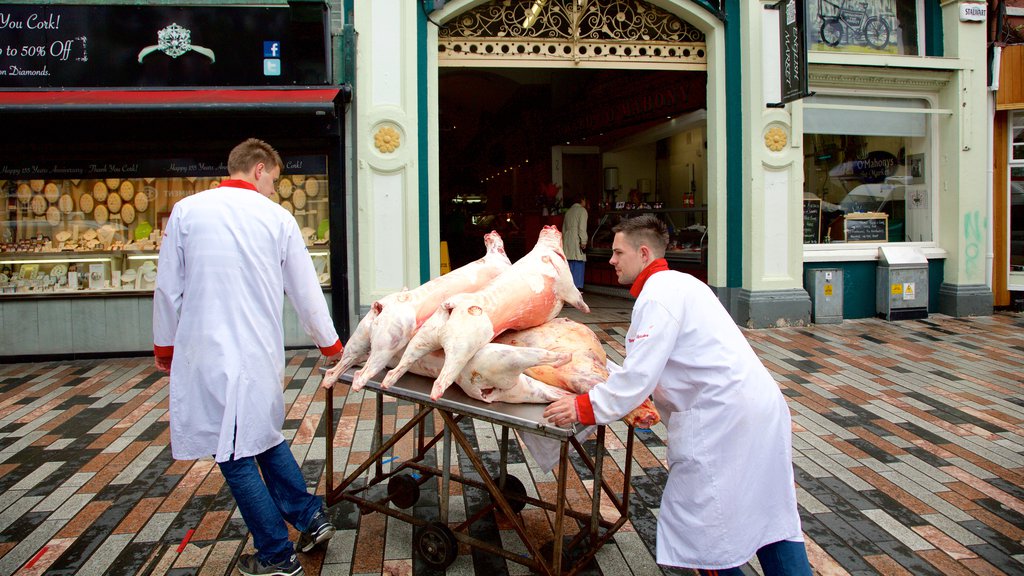 English Market showing markets and food as well as a small group of people