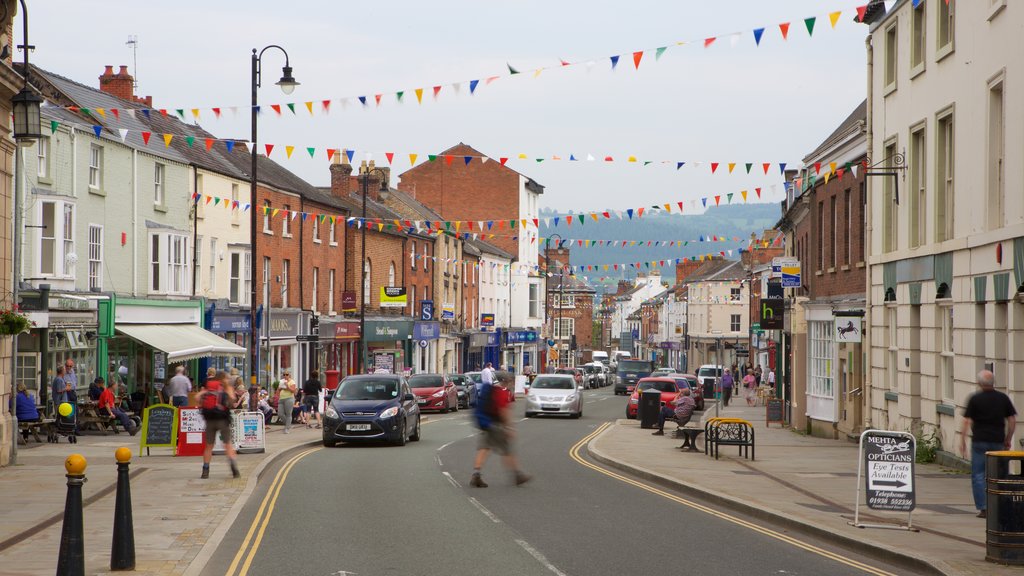 Welshpool showing street scenes and a city as well as a small group of people