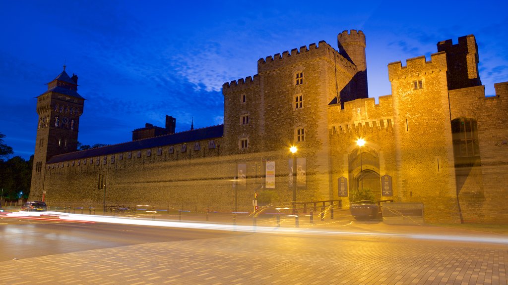 Cardiff Castle showing heritage architecture, heritage elements and night scenes