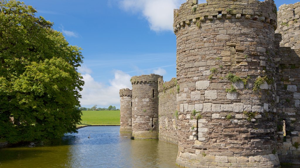 Beaumaris Castle which includes a castle, a river or creek and heritage elements