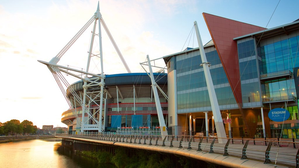 Millennium Stadium showing modern architecture and a river or creek