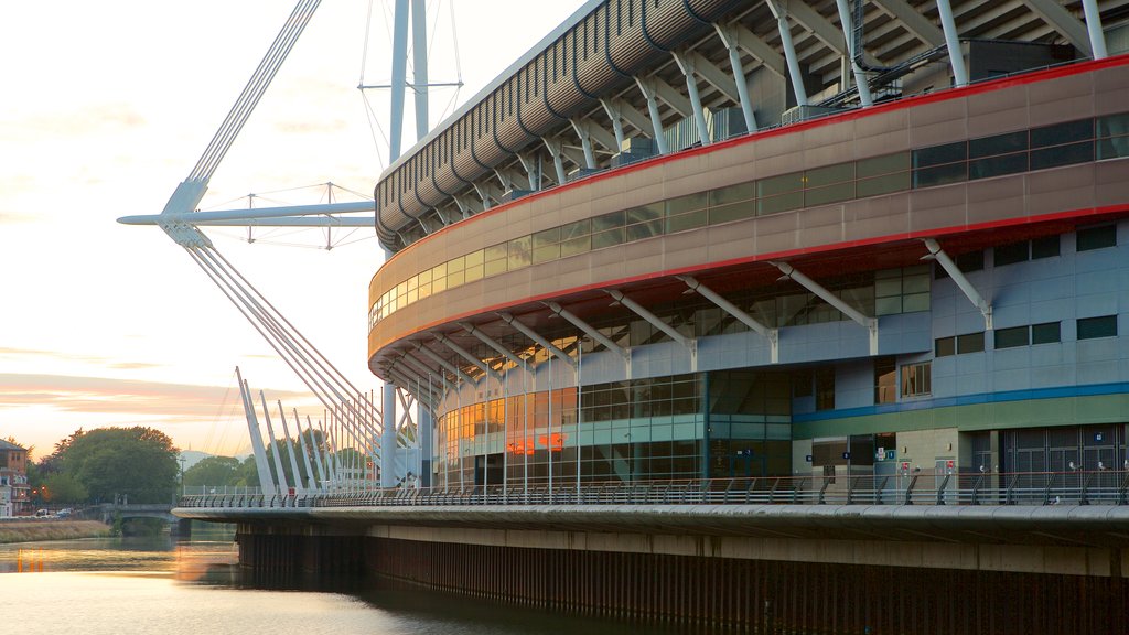 Millennium Stadium showing modern architecture and a river or creek