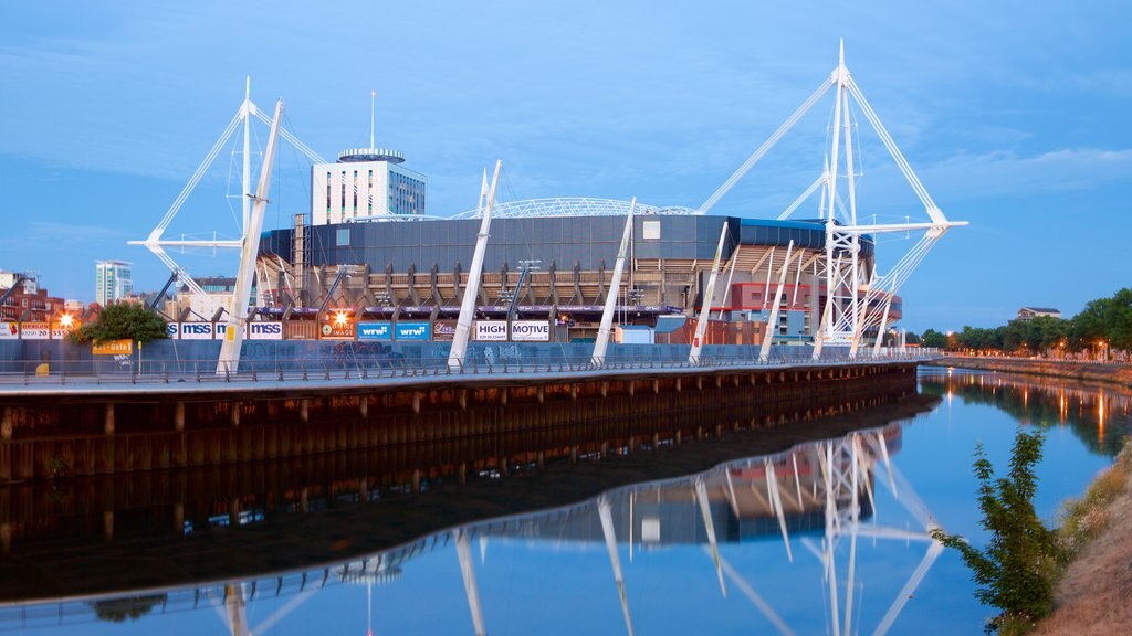 Millennium Stadium showing modern architecture and a river or creek