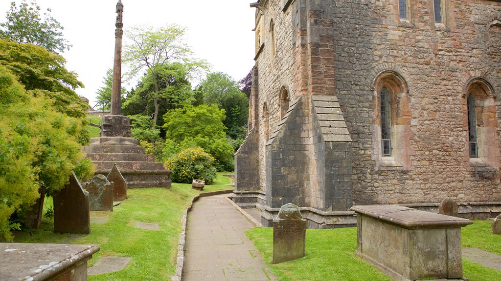 Llandaff Cathedral featuring a cemetery, religious elements and heritage elements