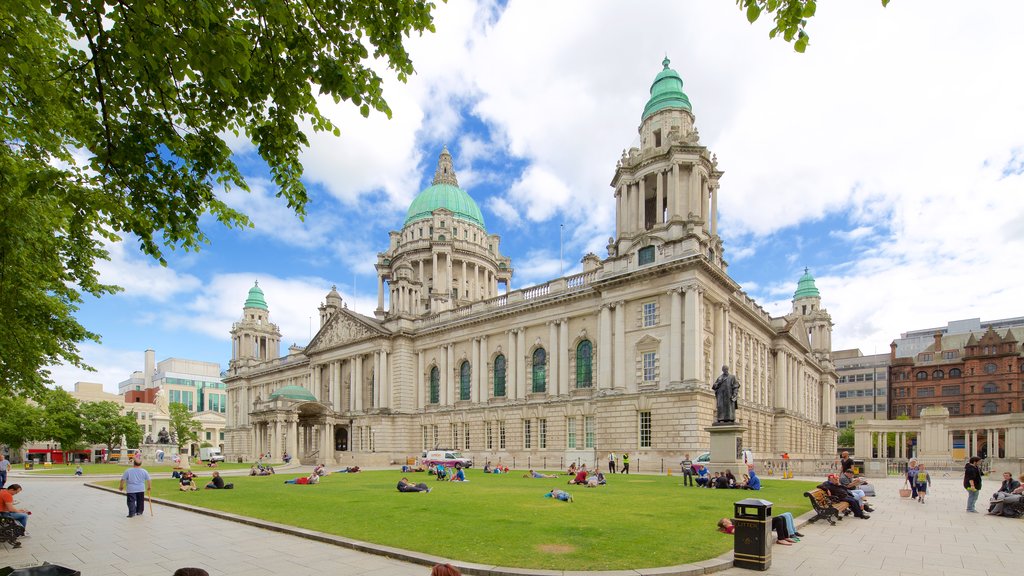 Belfast City Hall showing a park, heritage architecture and a castle