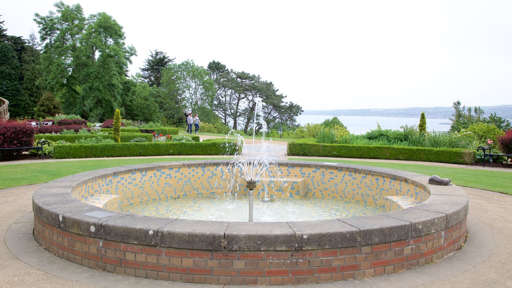 Belfast Castle showing a garden and a fountain