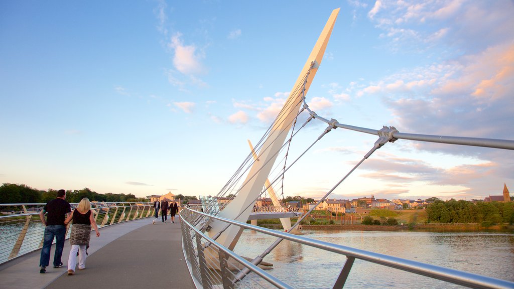 Peace Bridge showing modern architecture, a bridge and a river or creek