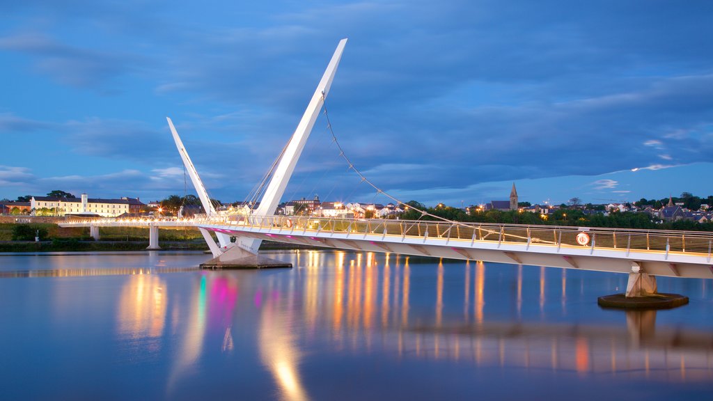 Peace Bridge showing modern architecture, a city and night scenes