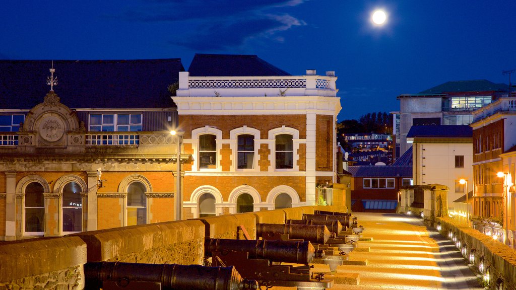 Derry City Walls which includes night scenes, heritage elements and heritage architecture