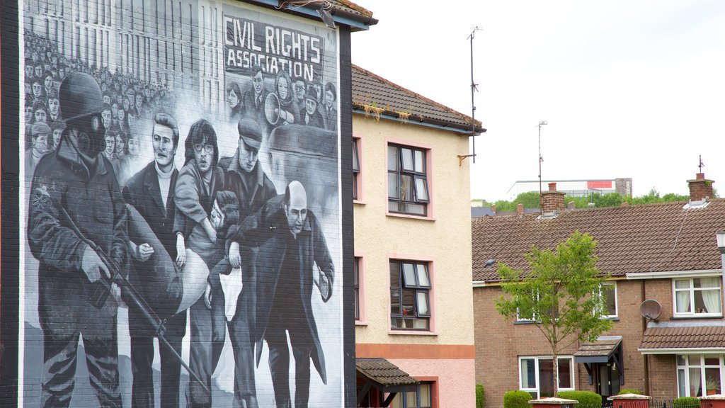 You are Now Entering Free Derry Mural featuring signage and outdoor art