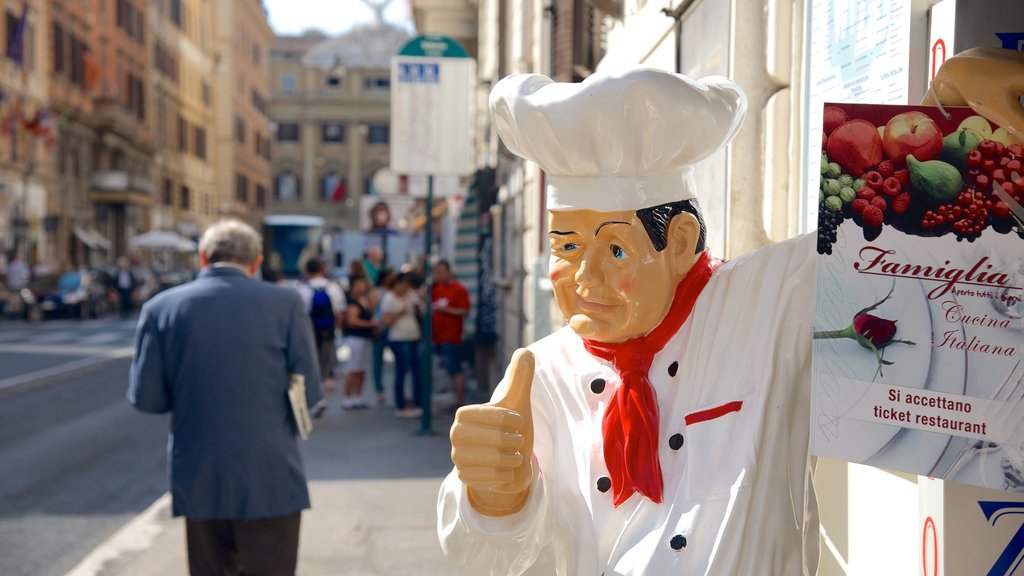 Via Marsala featuring dining out and street scenes as well as an individual male