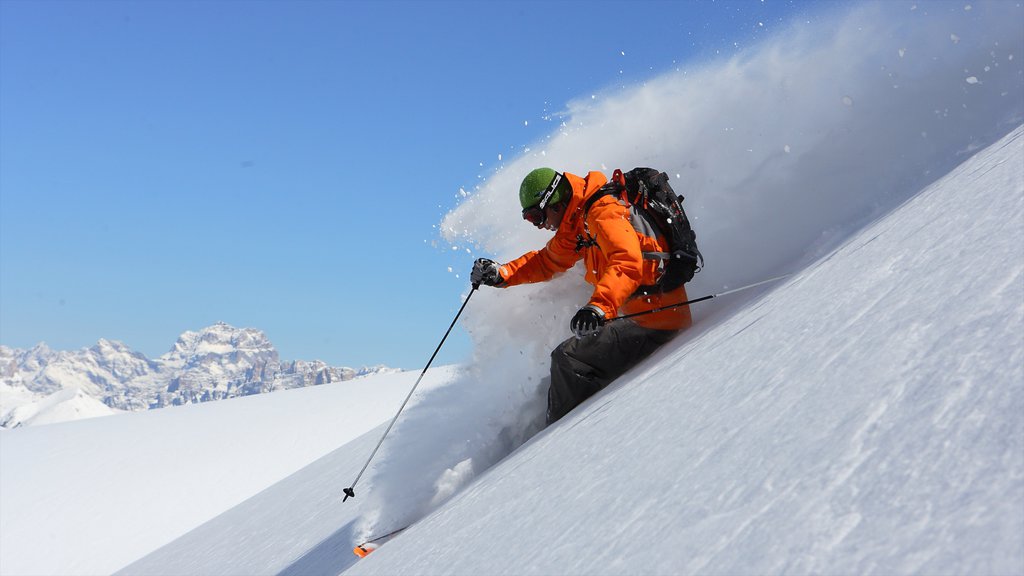 Fassa Valley featuring snow skiing and snow as well as an individual male