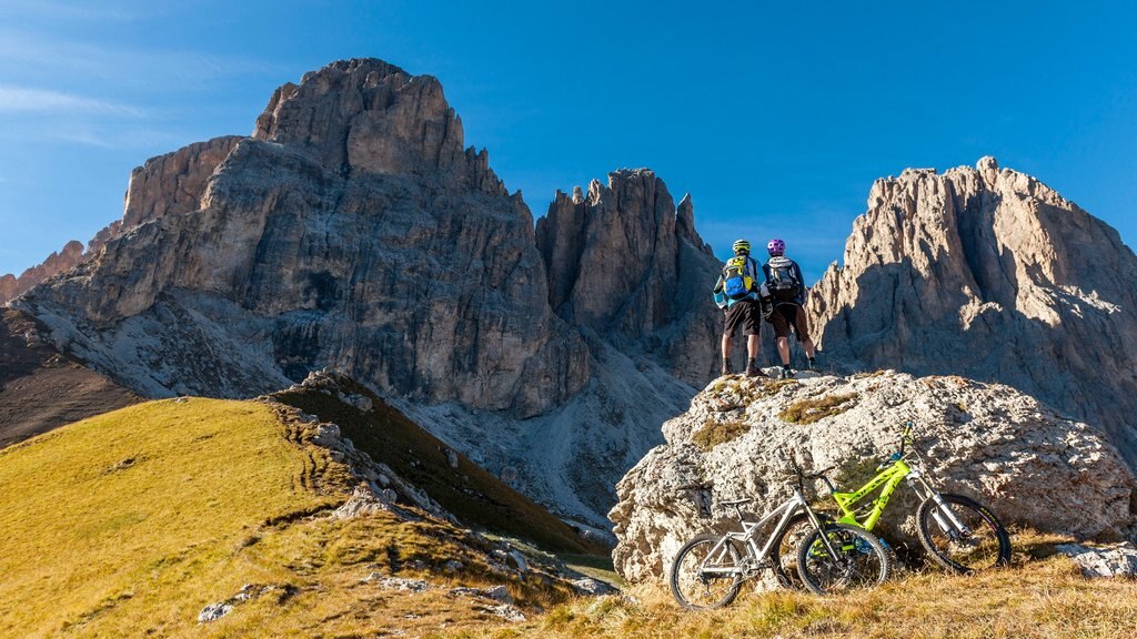 Fassa Valley showing tranquil scenes, mountain biking and mountains