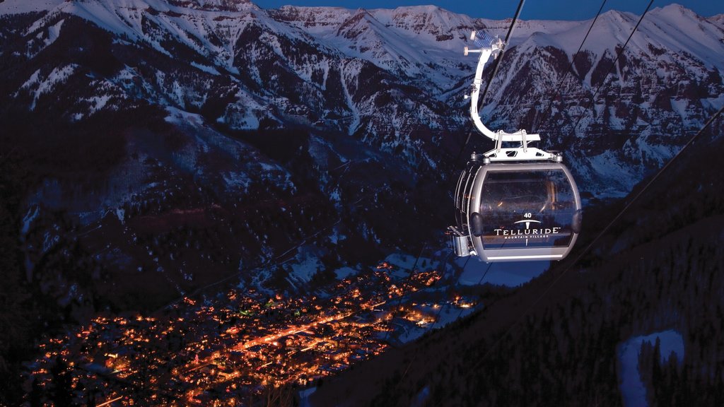 Telluride Ski Resort featuring a small town or village, night scenes and snow