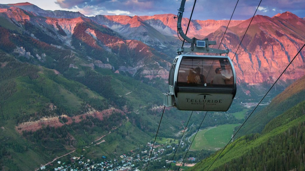 Telluride Ski Resort which includes a sunset, landscape views and a gondola