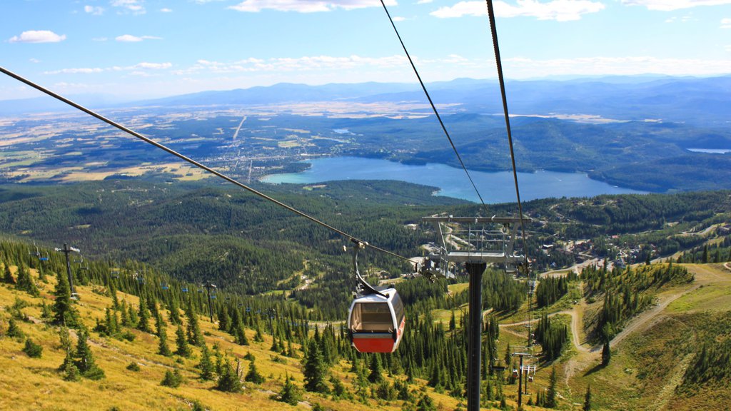 Whitefish Mountain Ski Resort which includes a gondola, a lake or waterhole and landscape views