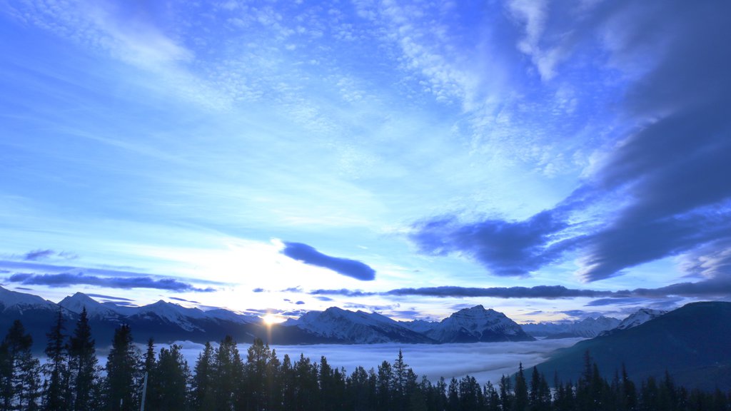 Marmot Basin showing landscape views, a sunset and mountains