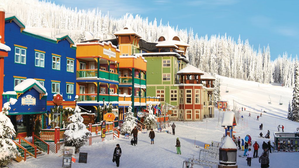 Silver Star Ski Resort featuring snow and a luxury hotel or resort as well as a large group of people