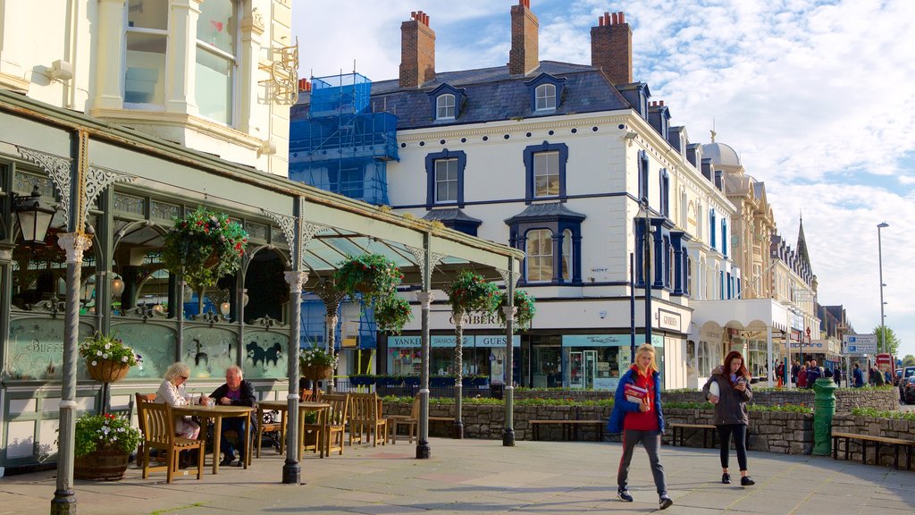 Llandudno showing street scenes as well as a small group of people