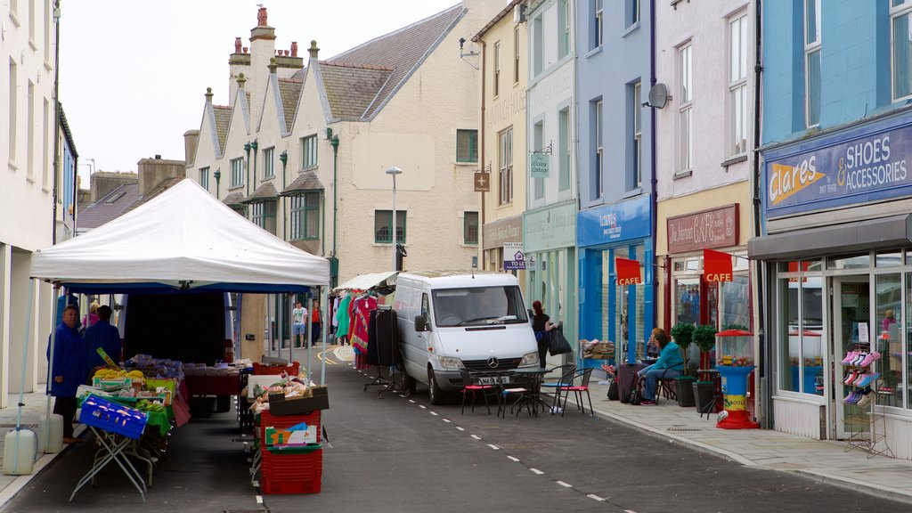 Holyhead which includes markets and street scenes