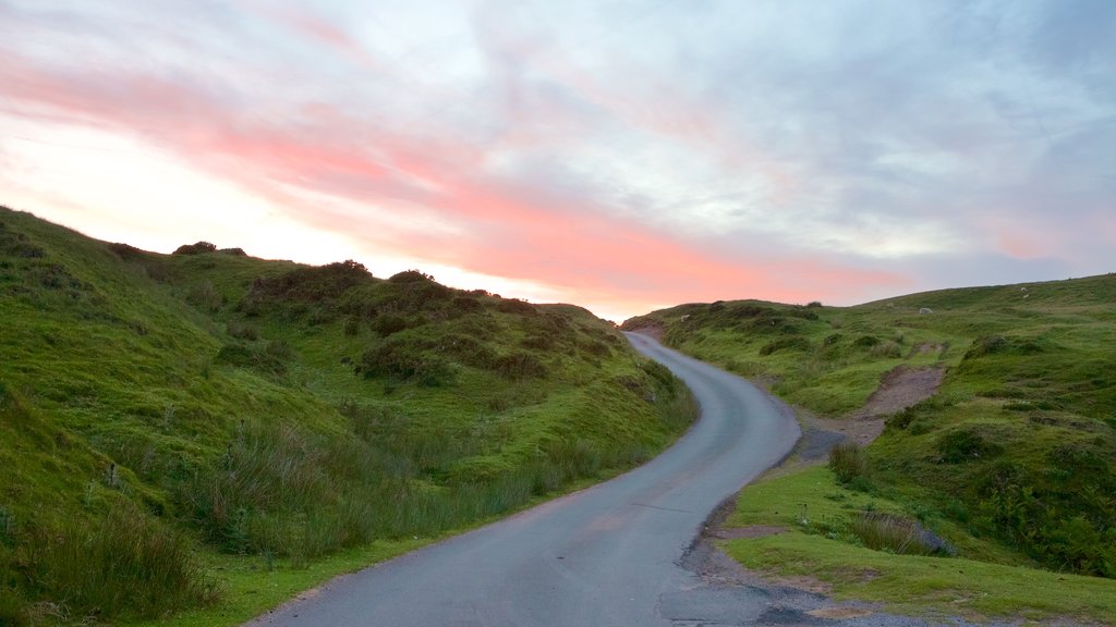 Brecon Beacons National Park showing farmland and a sunset