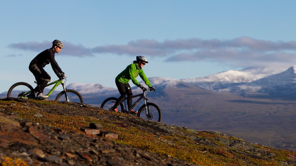 Bjorkliden Fjallby Ski Resort featuring mountain biking as well as a small group of people