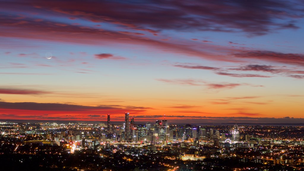 Mt. Coot-Tha featuring night scenes, a sunset and central business district