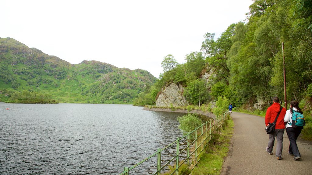 Loch Katrine which includes hiking or walking and a lake or waterhole