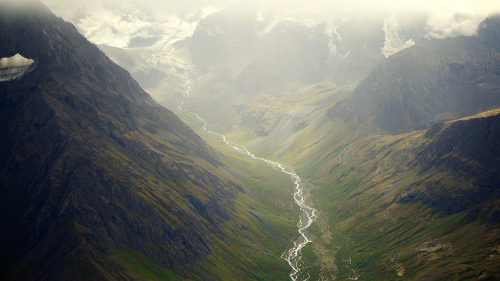 Chugach State Park showing mountains, a gorge or canyon and a river or creek